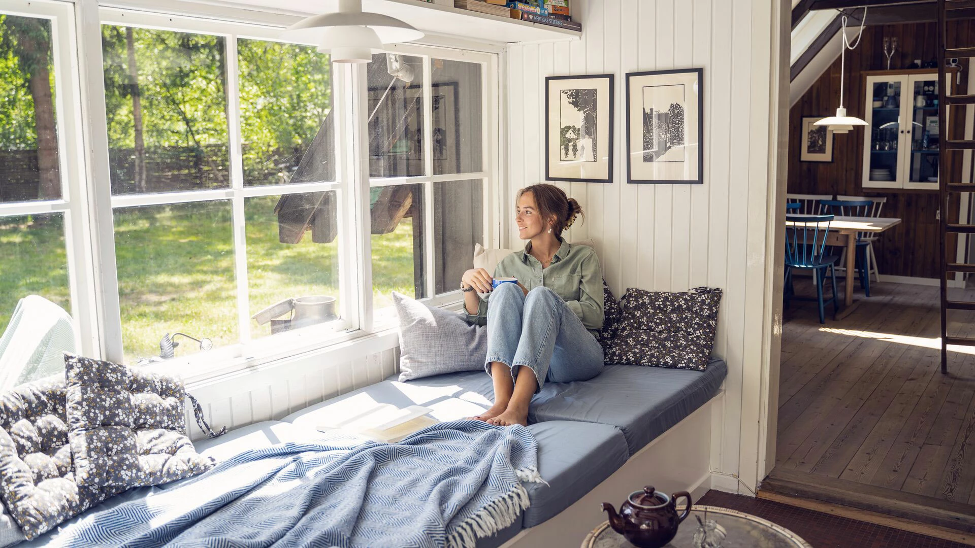 Young woman relaxing in her summer house