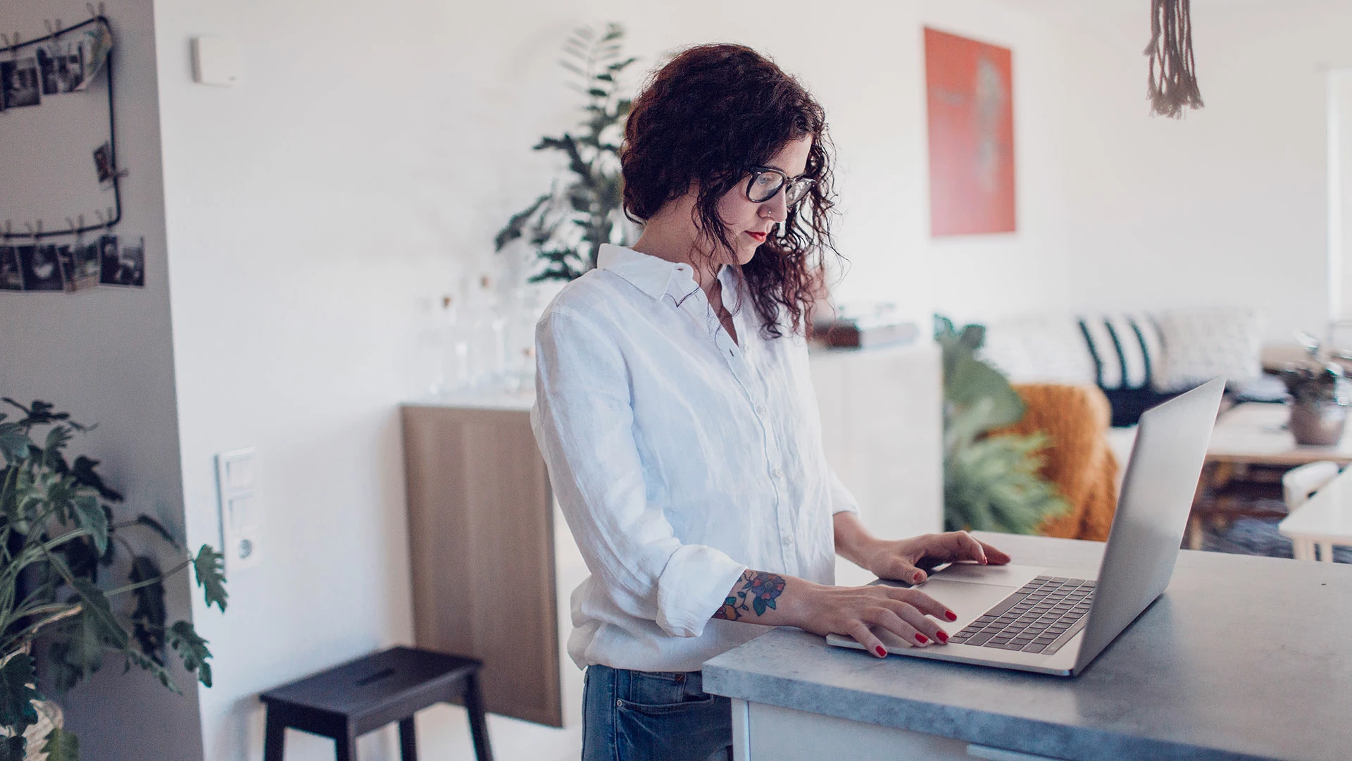 Woman using laptop at home
