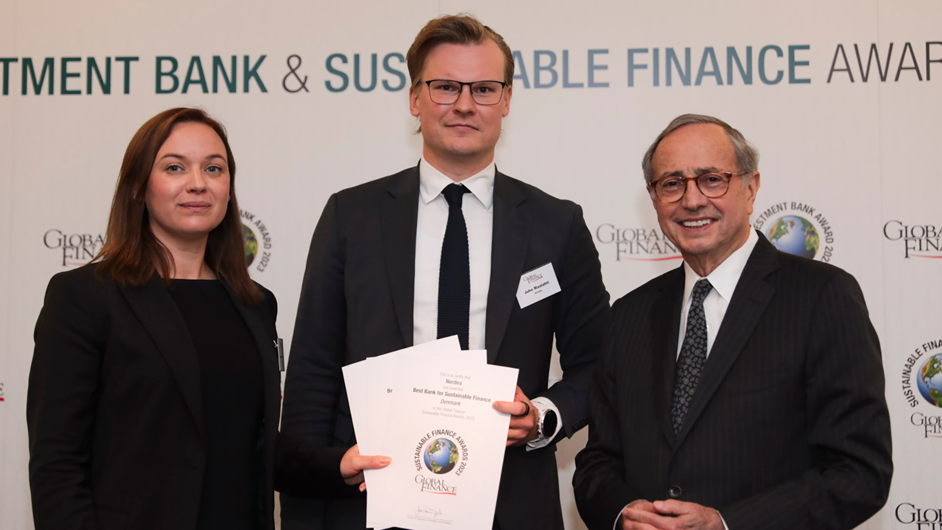 Photo from the Global Finance Sustainable Finance Awards 2023 featuring Nordea's Isabella Frenning Willis and Juho Maalahti as well as Global Finance's Joseph Giarraputo
