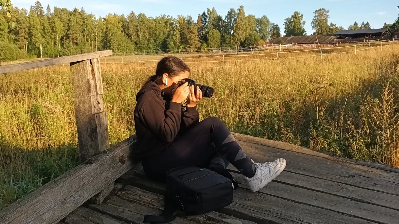 Young entrepreneur taking photograph