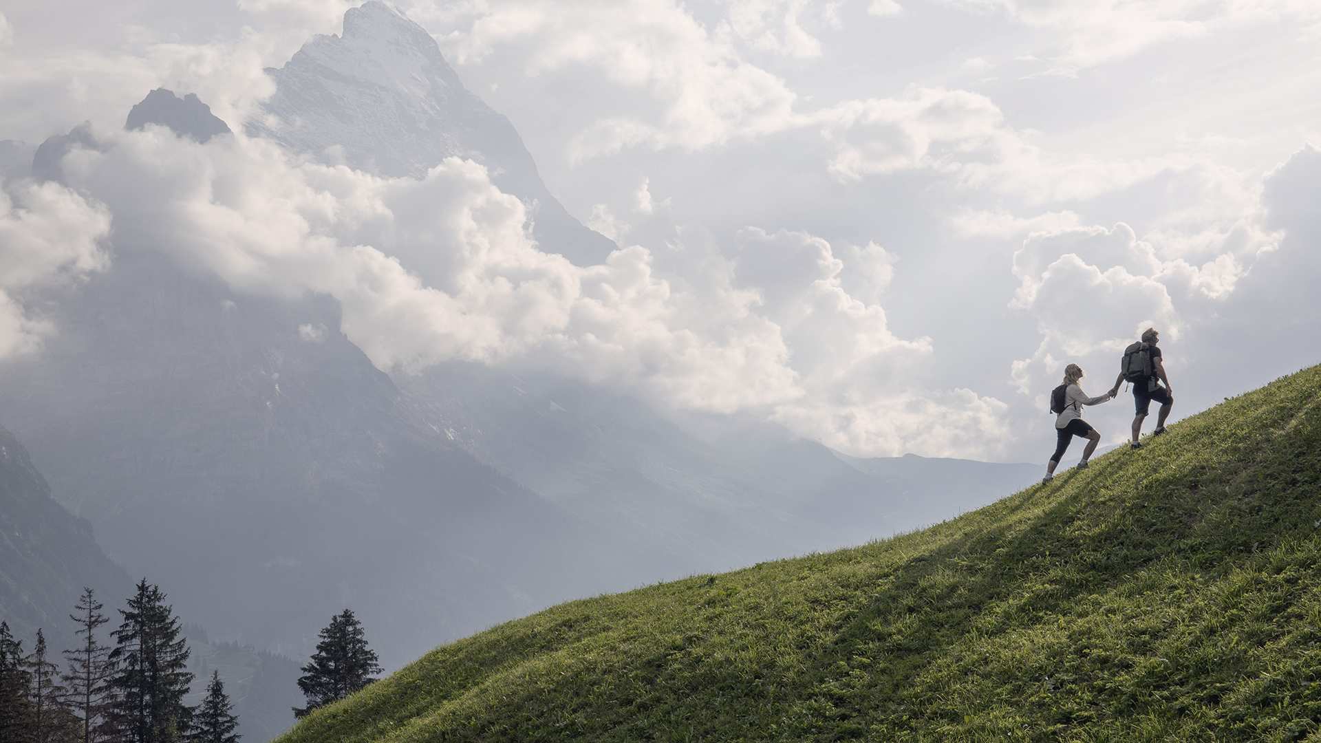 Hiking couple in an alpine meadow