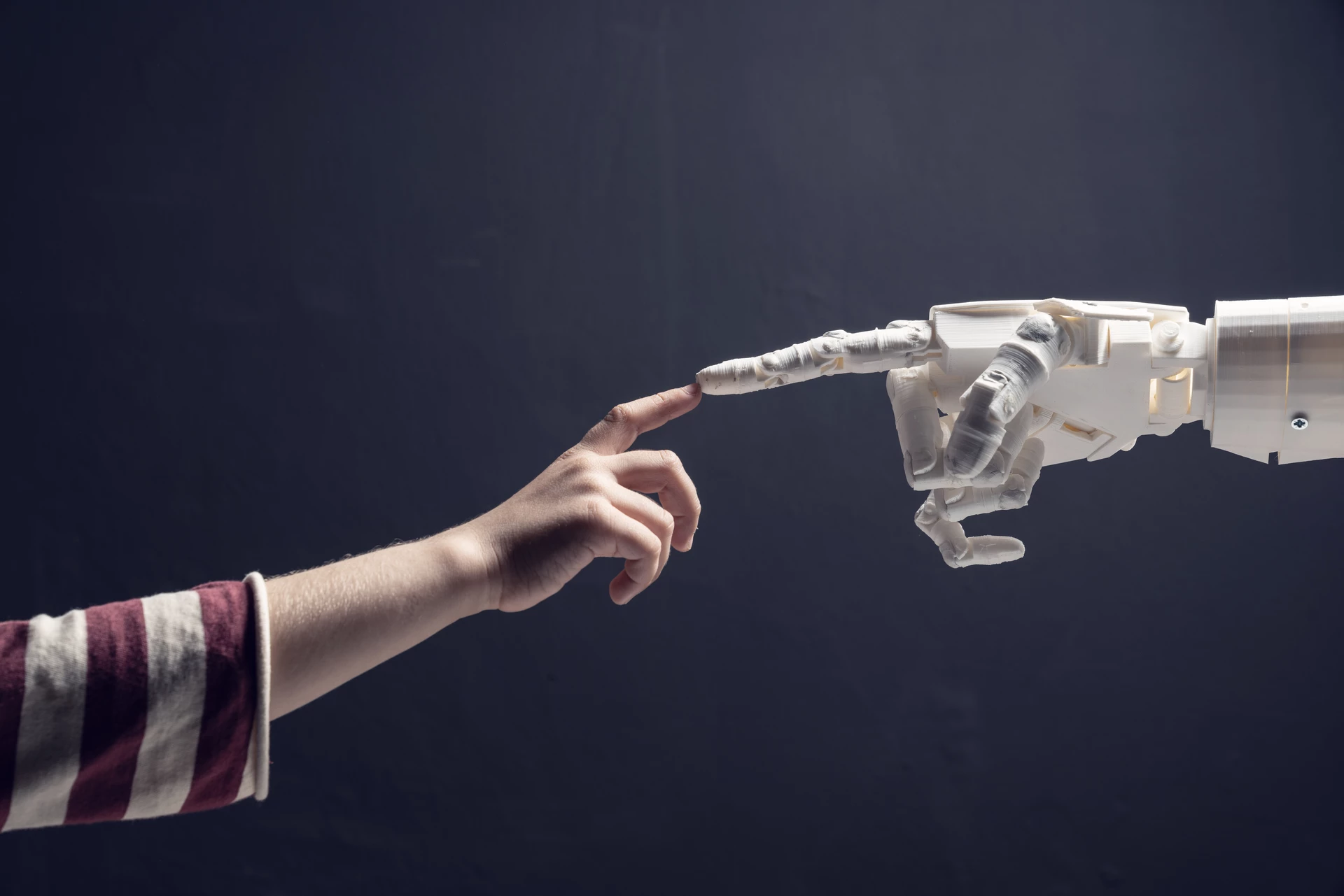Robot finger meeting human finger