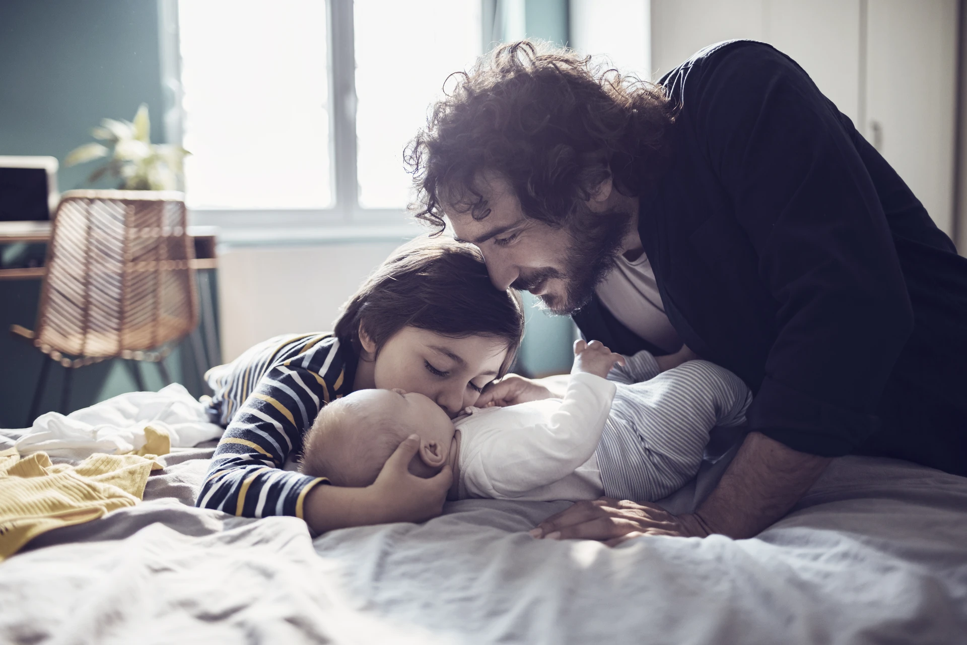 Father playing with his kids