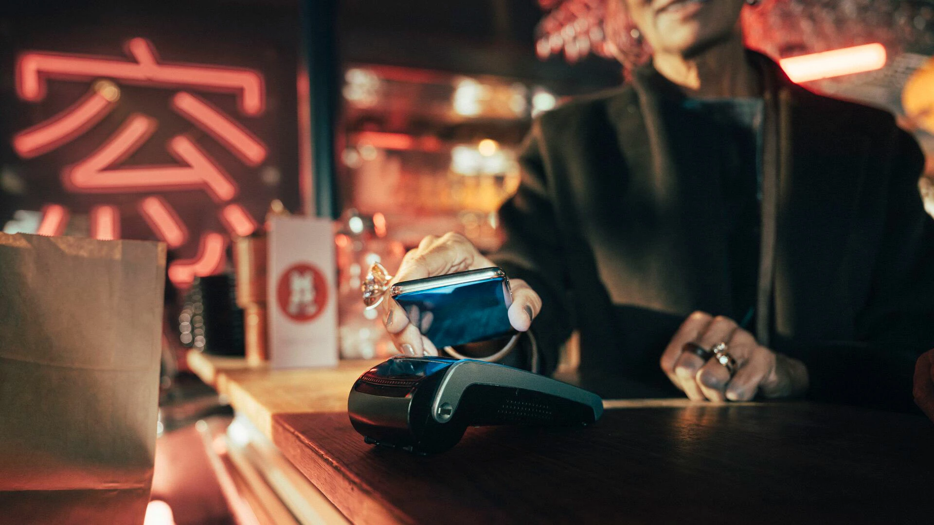 Woman makes mobile payment digital only