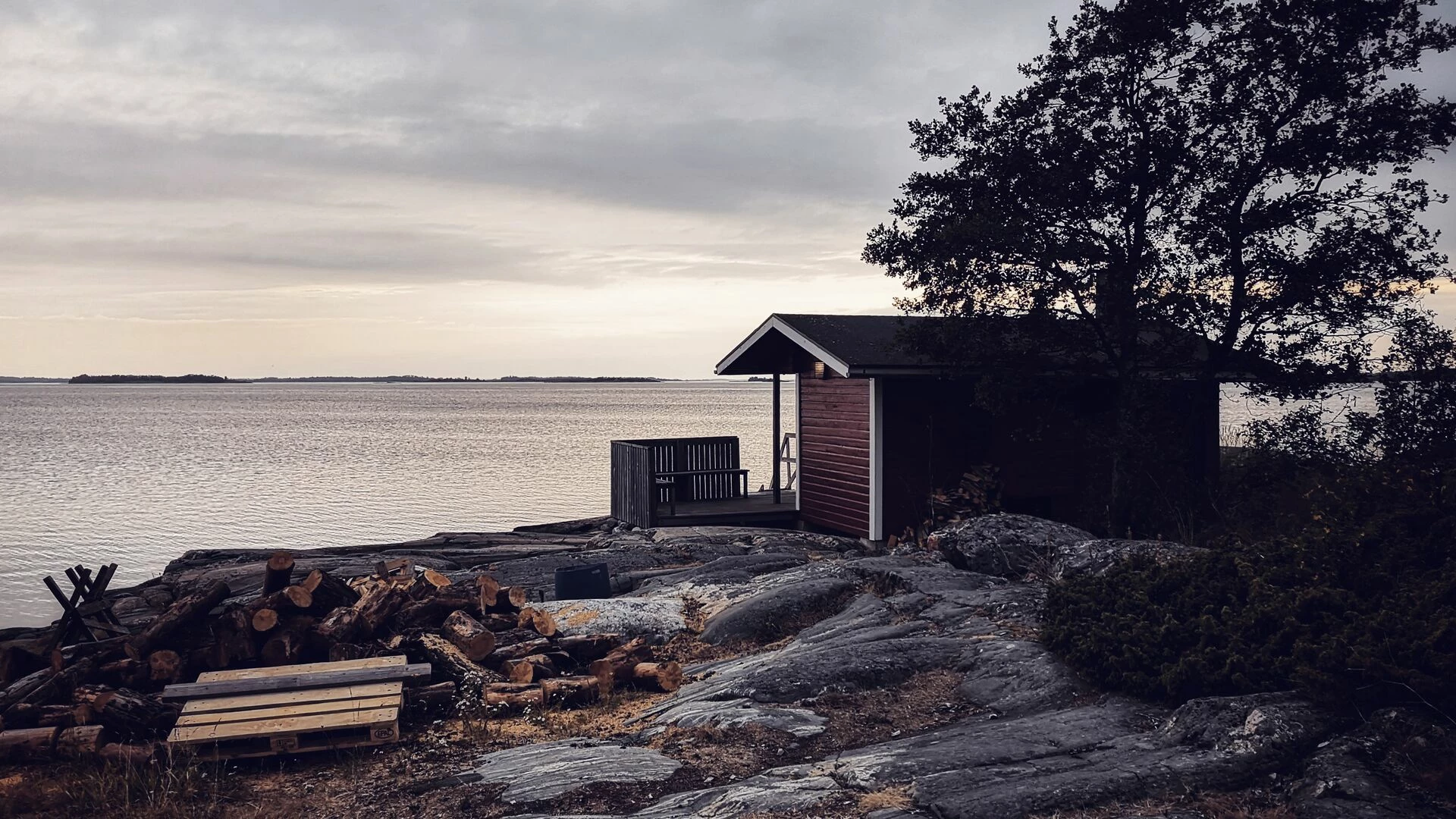 House or sauna by sea against sky