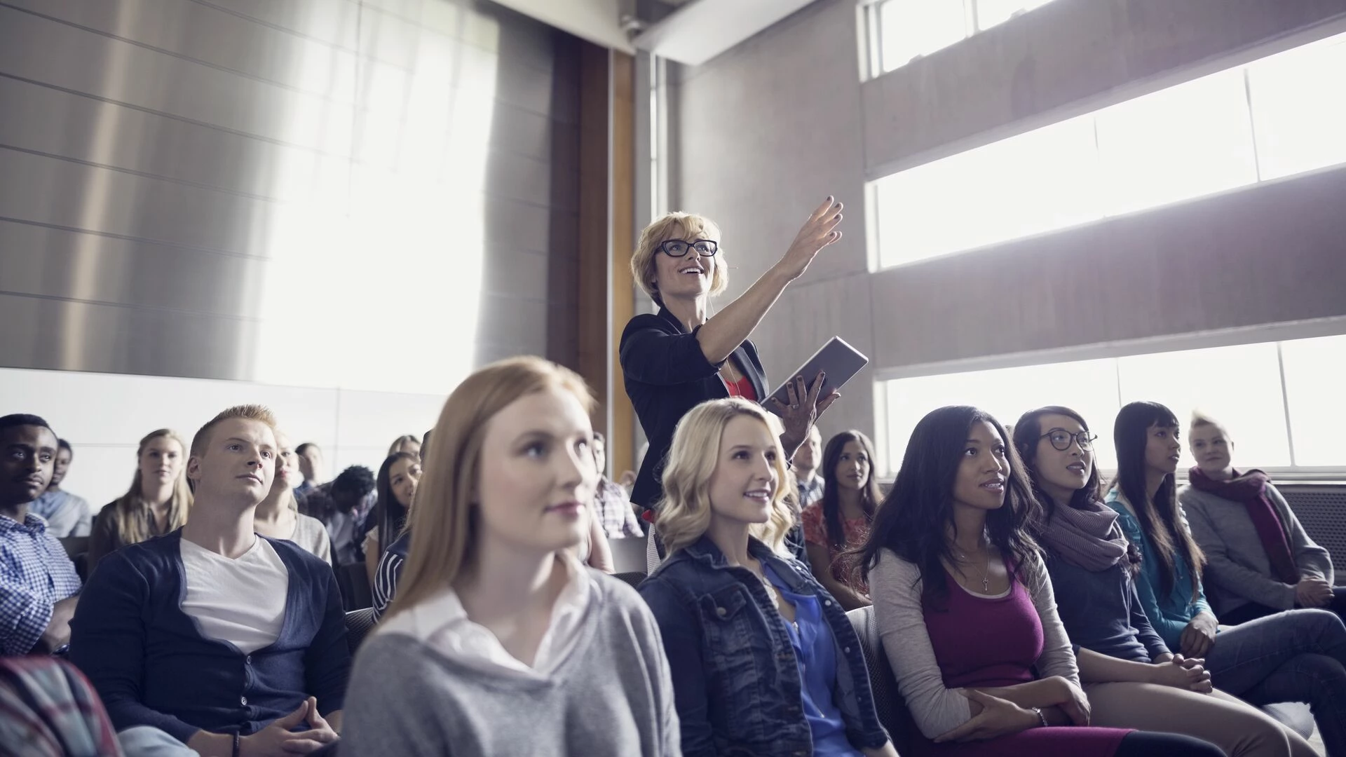 Young people in auditorium