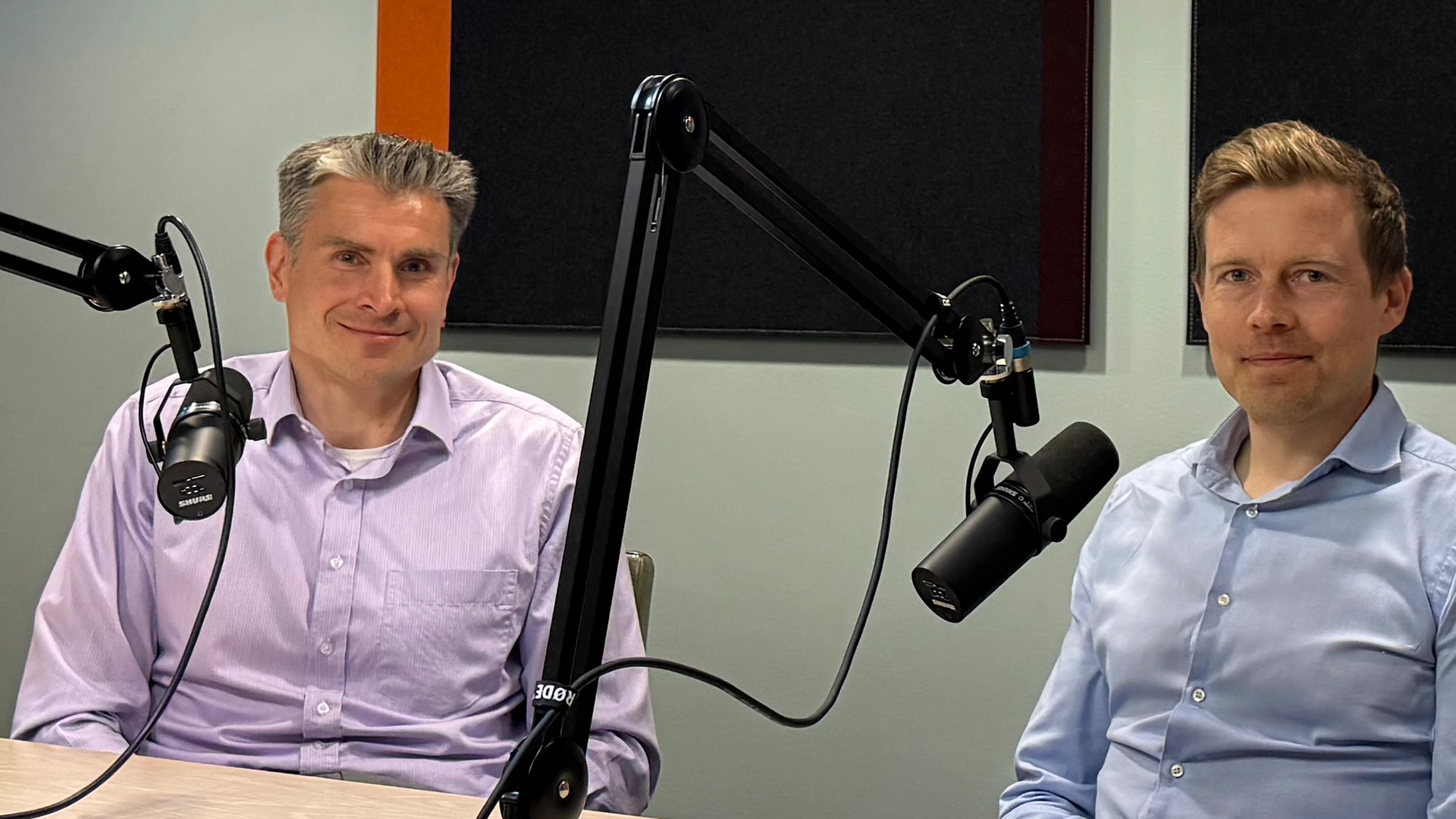Jan Von Gerich and Juho Kostiainen sitting in the podcast studio.