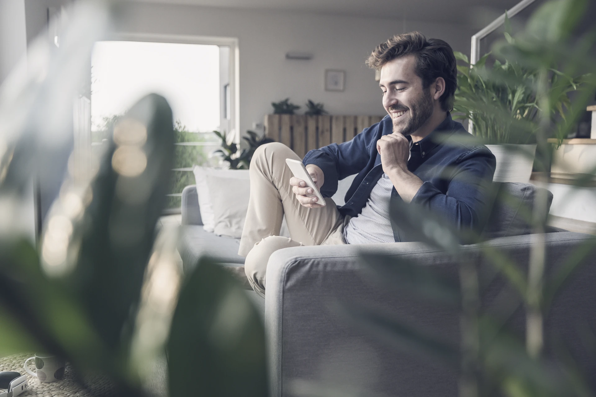 young-man-sitting-on-couch