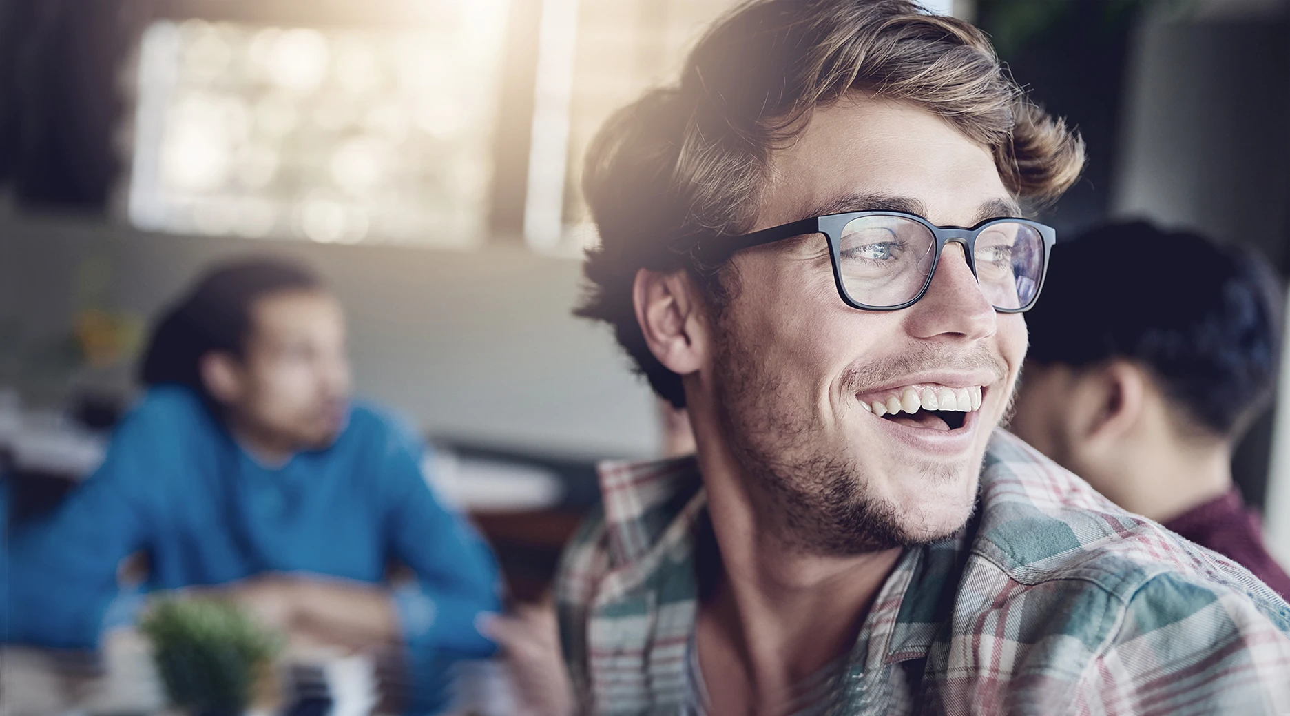 /Happy%20man%20in%20glasses%20looking%20to%20the%20side.%20.