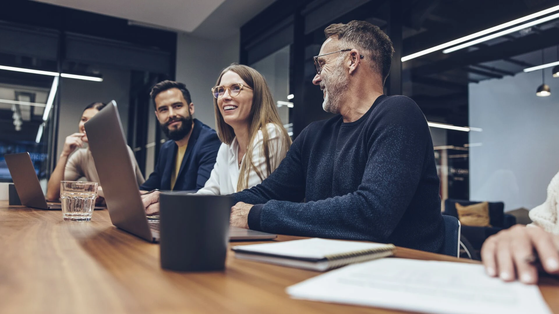 Group of people sitting at a desk