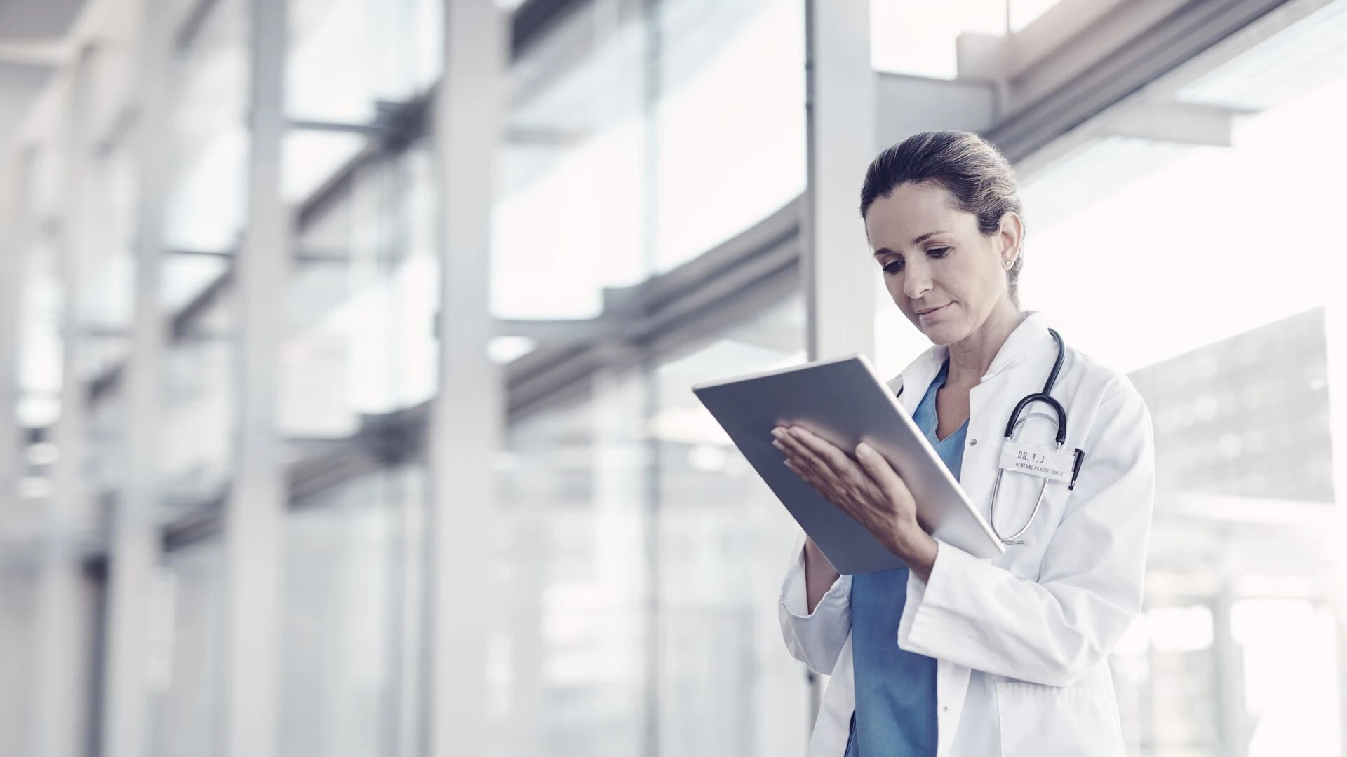 A female doctor using a digital tablet