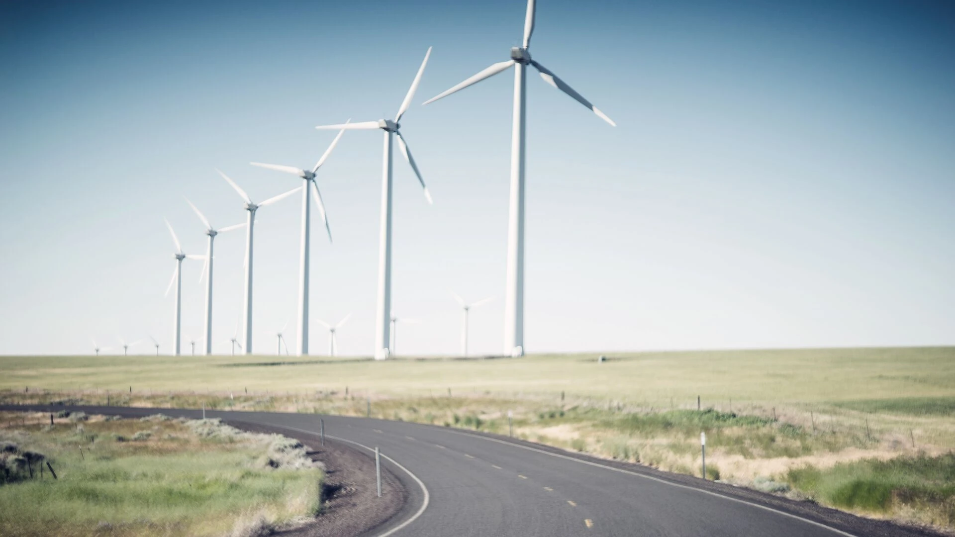 Windturbines along curving road