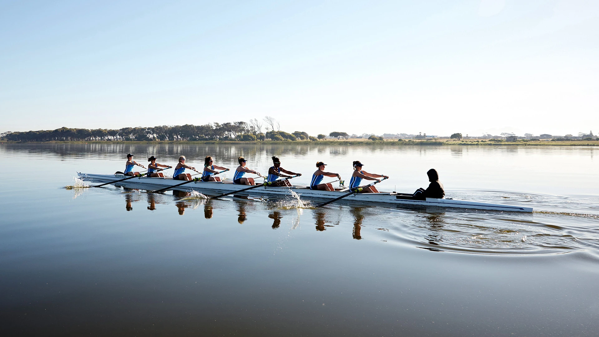 /Team%20rowing%20on%20a%20river..