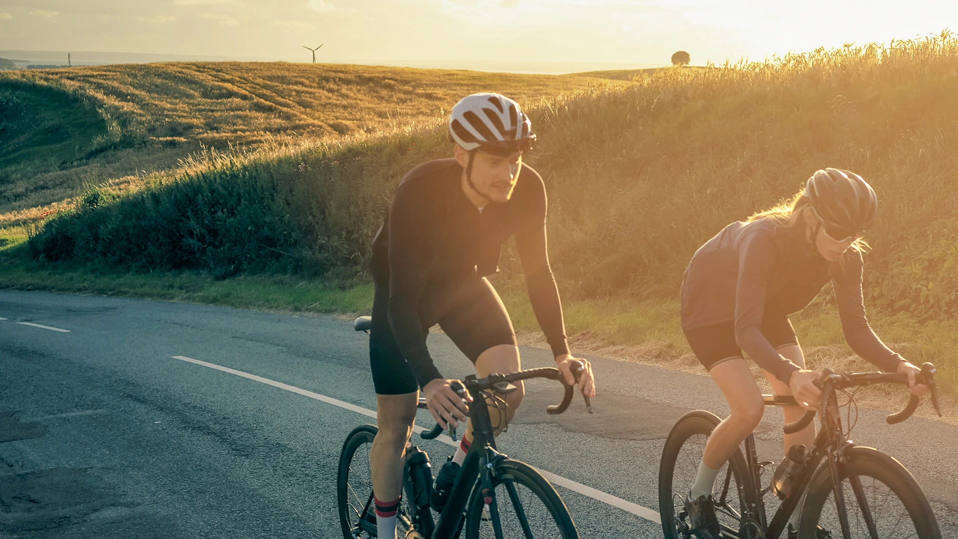 /Two%20people%20on%20a%20bike%20up%20a%20hill.%20.