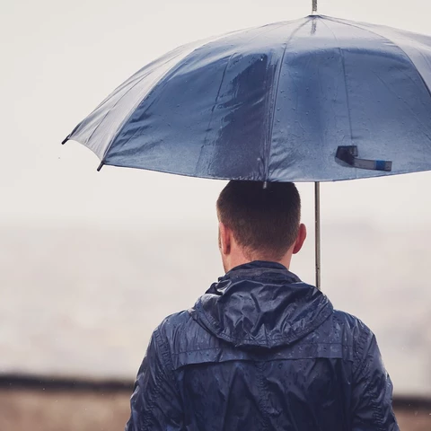Man with umbrella