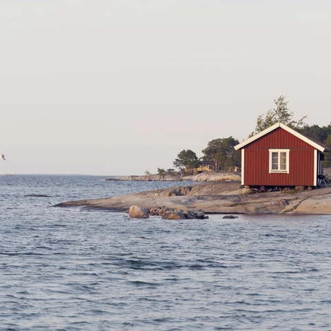 Sunset on a cute little cottage in the archipelago