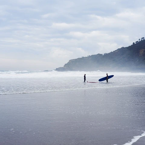 Two surfers at the beach
