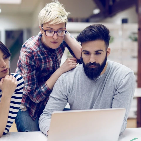 Young web developers planning project.