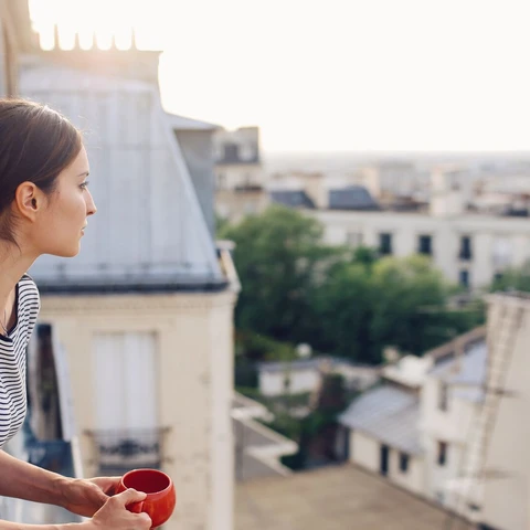 Young woman in Parisian apartment