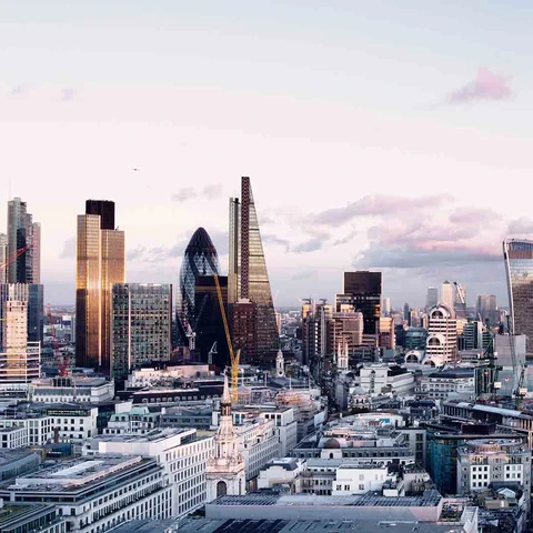 Image of the London city skyline at sunset