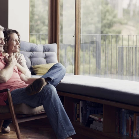 Thoughtful mature couple at home