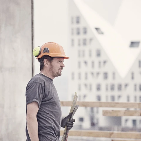 Craftsman with helmet on building site