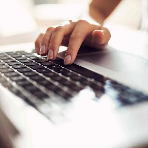 Woman doing work on a computer