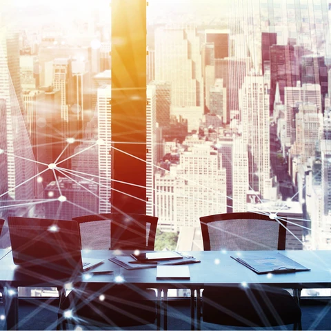 Desk in building with city view