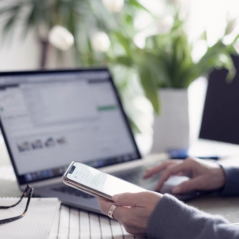 Woman working from home using laptop