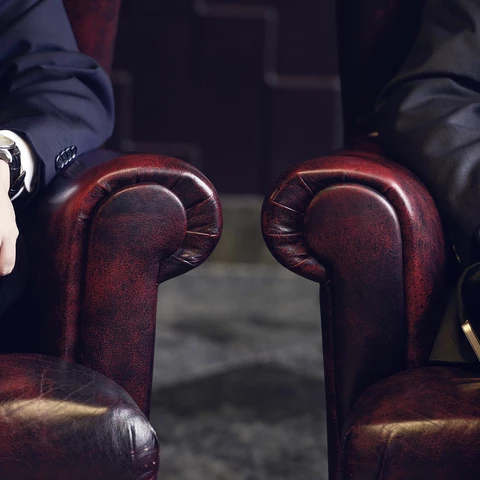 Businessmen sitting in sofa