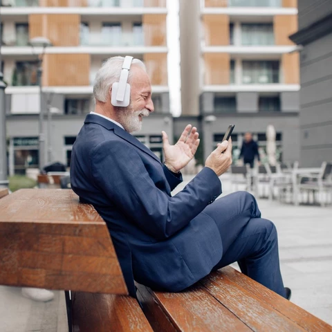 Older man looking at phone
