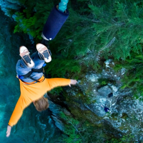man-jumping-from-cliff