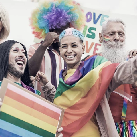 People from different generations having fun at Pride parade
