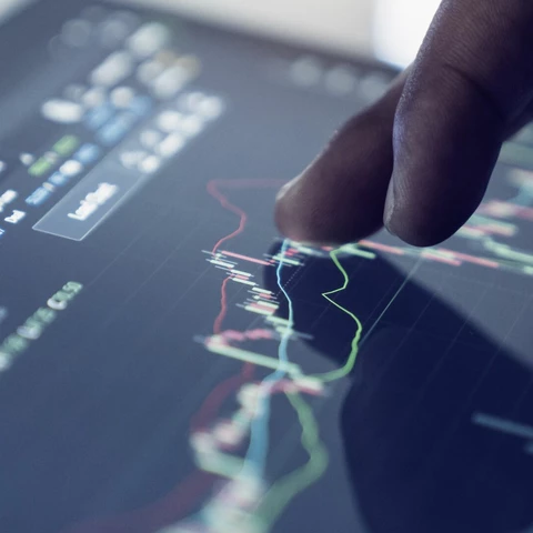 Market analyze with digital monitor.