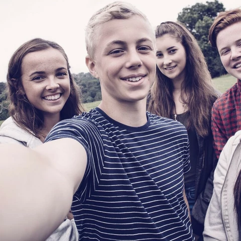 teens taking a selfie