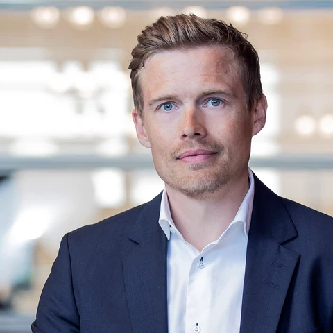 Juho Kostiainen, Ekonomisti