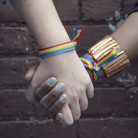 Couple holding hands