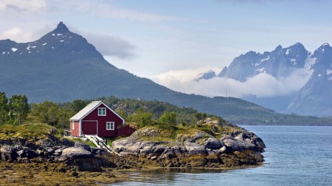 Shoreline-of-Raftsund-strait-with-red-painted-house