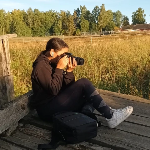 Young entrepreneur taking photograph