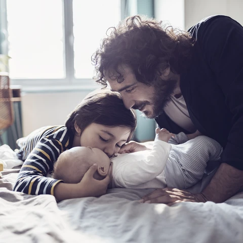 Father playing with his kids