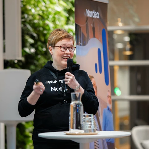 Women giving a speech at the event