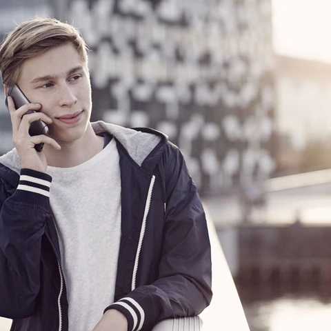 young-man-talking-on-phone