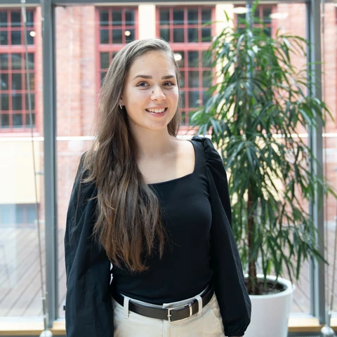 Young women standing at the office