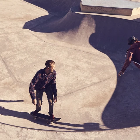young-men-skating-at-a-skate-park