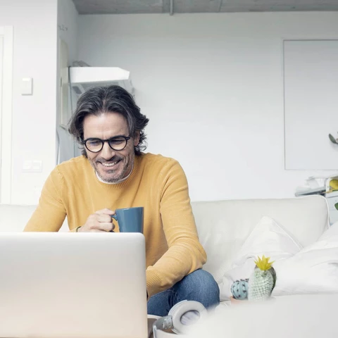 Happy man working from home