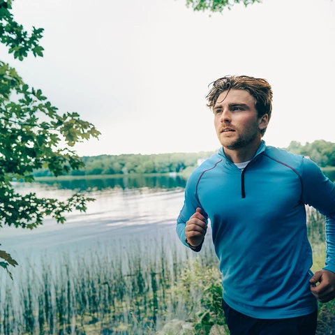 A man is running in nature