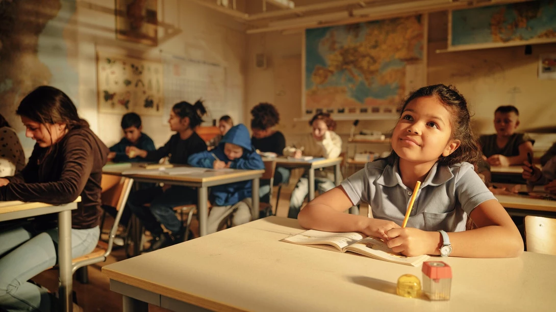 Girl in classroom table