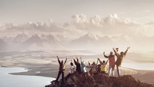 Big group of people on a mountain.